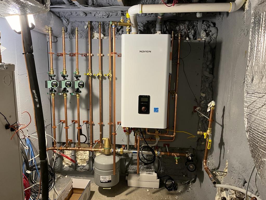 Navien tankless heating system with multi-zone copper manifold in Greater Boston, MA