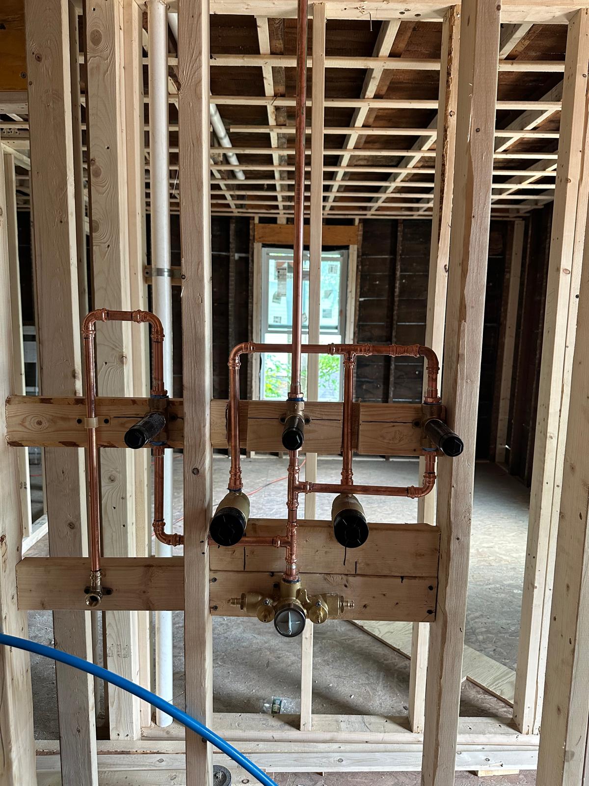 Copper shower and tub valve rough-in in a framed bathroom, Greater Boston, MA